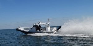 Silver Ships Ambar Series AM 1200 making wake in ocean