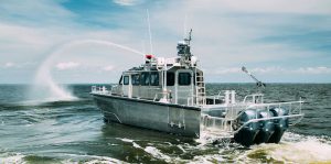 Silver Ships Endeavor Series fire boat in action with outboards showing
