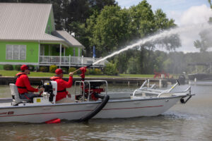 RescueOne Boat on the water spraying water